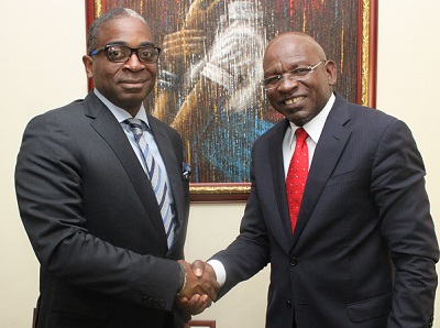 l-r: Mr. Olusegun Awolowo , newly appointed ED/CE of NEPC shakes hands with Mr. Roberts  Orya, MD of NEXIM Bank during a visit by the former recently